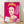 Pop art portrait of Queen Elizabeth II in vibrant pink tones, inspired by Andy Warhol's Reigning Queens series, displayed as a framed poster on a wall.