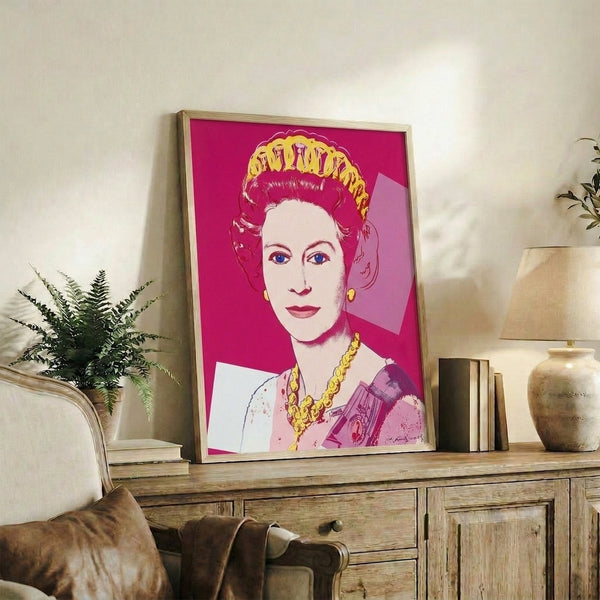 Contemporary pop art portrayal of Queen Elizabeth II in striking pink shades, part of Warhol's celebrated Reigning Queens series, mounted as wall art.