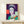 Framed pop art representation of Queen Elizabeth II in purple, reflecting the boldness of contemporary royal imagery.
