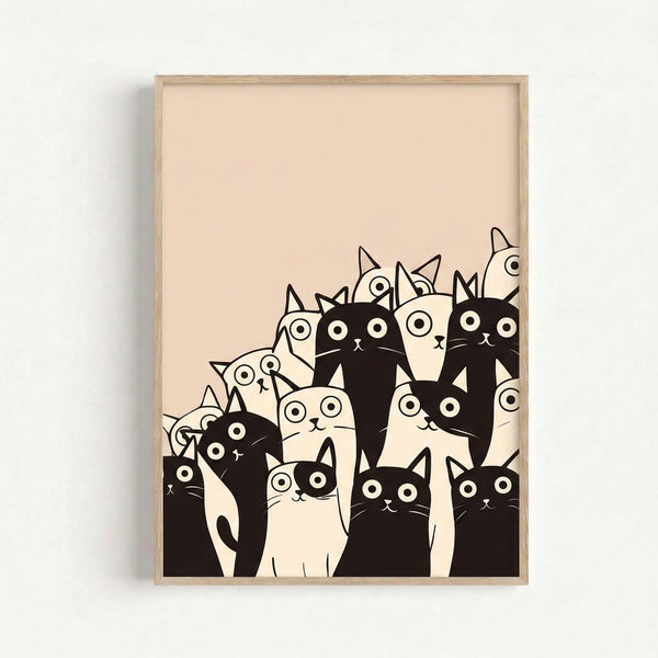 Whimsical framed poster featuring quirky cats drawn in modern minimalist style, black linework on tan and white, hung as contemporary wall art.