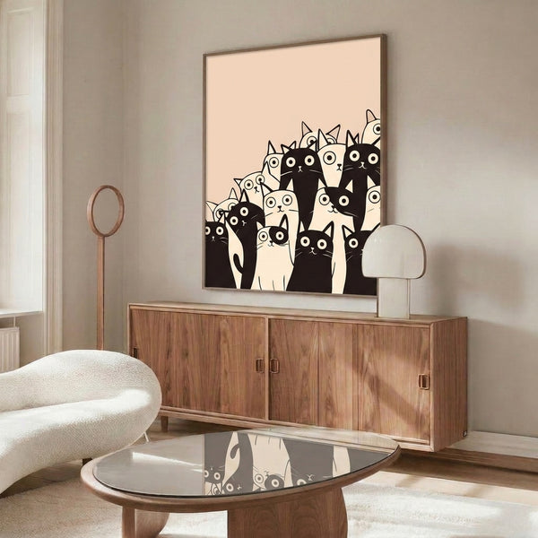Playful line art print depicting a crowd of stylized cats in black and white on a warm cream background, minimalist modern design.
