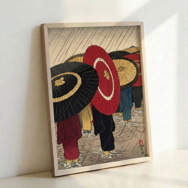 Vintage-style Japanese woodblock poster of a rain-soaked street with silhouetted figures and vibrant red umbrellas, composed in warm cream and gold with cool blue details.