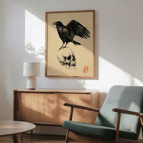 Wall-mounted poster of a contemplative bird study: a crow perched on skull imagery in bold black lines with ochre highlights, merging dark gothic and traditional Asian art influences.