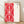 Framed Japanese woodblock-style poster featuring a bold crimson karakusa arabesque pattern on cream background, elegant and ceremonial in mood.