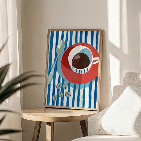 Framed contemporary poster of a blue-striped coffee cup with spoon and coffee beans arranged on white and cream, embodying calm minimalist design.