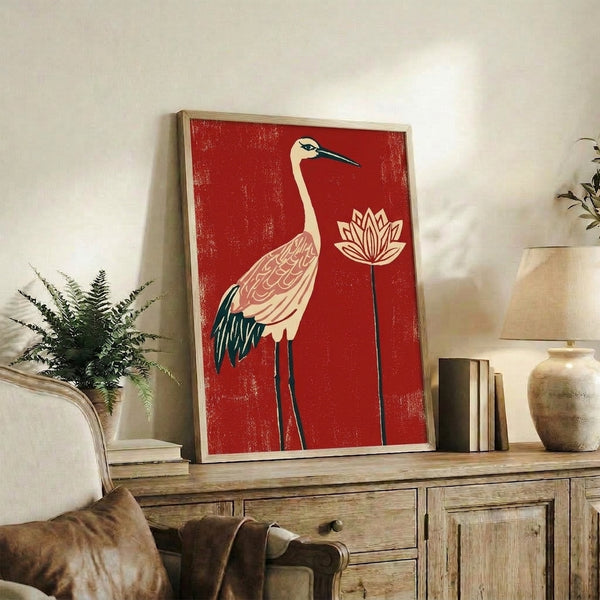 Minimalist wall art depicting a graceful red crane poised near a lotus flower in soft cream and deep rose hues with art deco influences.