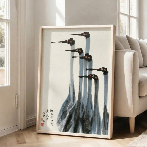 Serene Japanese ink painting of cranes among mountains, charcoal and black brushwork on cream paper, minimalist aesthetic with crimson red accents, framed art print.