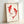 Framed art print showcasing two elegant red koi with flowing fins rendered in a serene, minimalist Japanese style on cream paper.