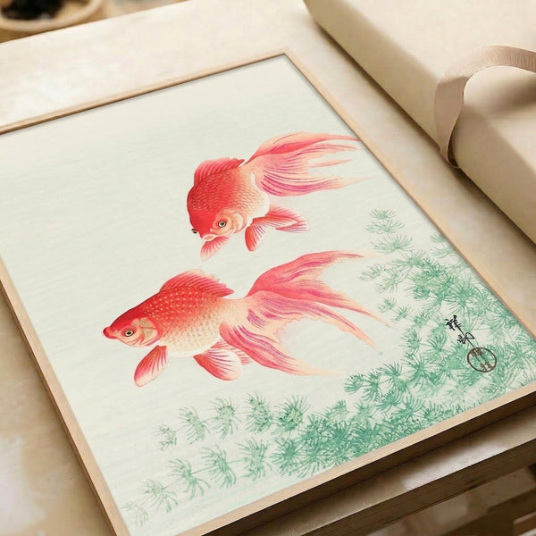 Framed Japandi-style poster depicting two fish in graceful aquatic setting with cream, pale pink, and green watercolor rendering.