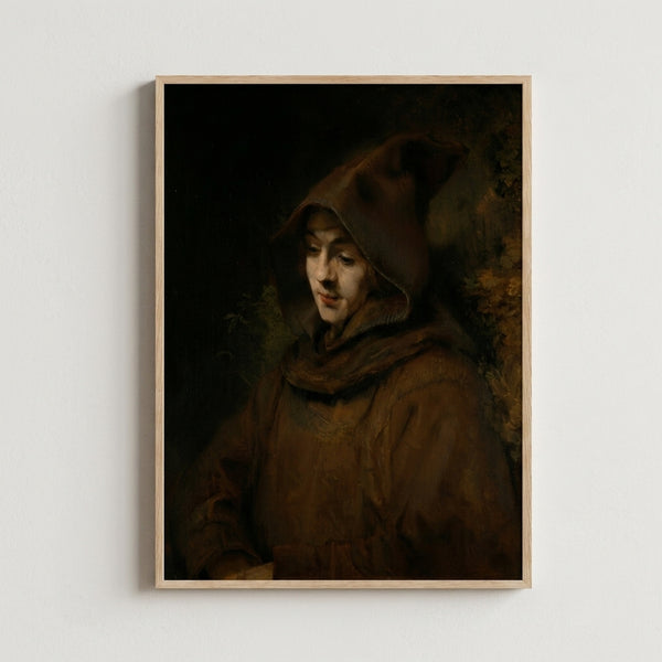 Dutch Golden Age portrait painting showing a young man in monastic robes against a shadowy background, characteristic of Rembrandt's masterful use of chiaroscuro and warm earth tones.