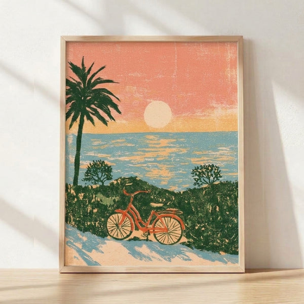 Retro coastal art print featuring a bicycle parked on sandy beach with palm tree and golden sunset over teal ocean, rendered in warm coral, cream, and forest green tones.