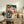 Nostalgic retro poster combining a turntable, speaker, headphones, and hot beverage in vibrant orange and sage green hues, ideal for music enthusiasts and creative spaces.