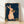 Retro pop art poster of a whimsical rabbit playing violin on grass, rendered in navy blue, coral peach, cream, and ochre gold with playful vintage charm.