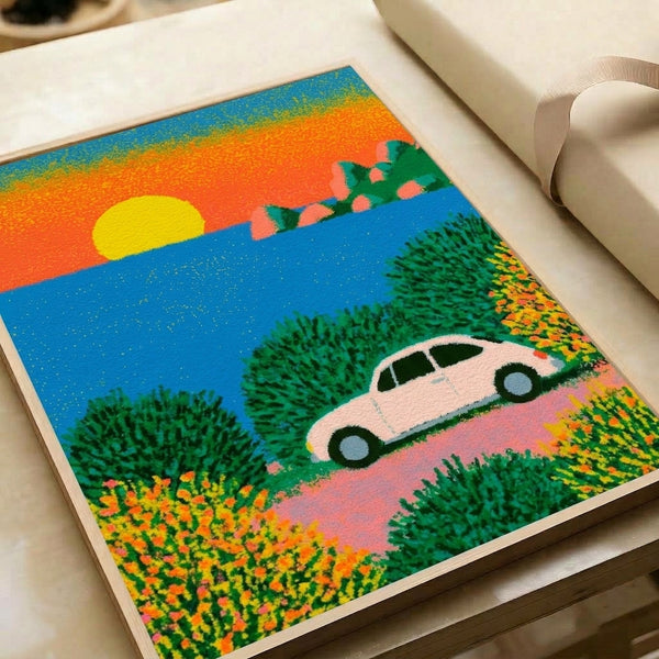 Modern retro-style framed poster depicting a peaceful sunset coastal scene with a vintage Beetle car, blooming flowers, and rocky shoreline rendered in bright yellows, oranges, blues, and greens.