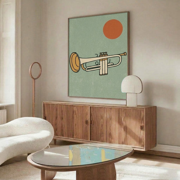 Framed retro artwork depicting a trumpet and bold sun symbol rendered in cheerful golden yellow, burnt orange, and sage green palette.
