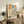 Mid-century modern poster showcasing stylized musical instruments and notes in a jazzy palette of tan, teal, and orange with nostalgic appeal.