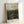 Dark academia wall art depicting an intimate woodland rendezvous surrounded by charcoal and sage foliage in romantic vintage Impressionist style.