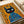 Graphic pop art poster of a regal black cat wearing a crown, executed in bold orange, blue, and red tones with comic book-style visual impact.