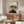 Asian cultural wall art featuring a contemplative warrior and sacred mountain in minimalist composition, rendered as a framed poster with cream, tan, and burnt gold accents.