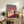 Minimalist Japandi wall print capturing a samurai's moment of reflection at sunrise over Mount Fuji, with glowing coral-red sky merging into cream and navy tones, evoking quiet contemplation.