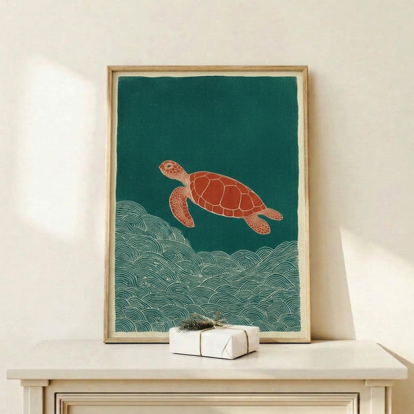 Coastal wall art print featuring a sea turtle rendered in rust and seafoam tones against flowing waves in Japanese woodblock line art style.