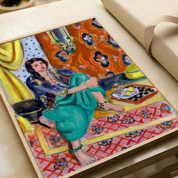 Framed modern art poster presenting a reclining odalisque figure in rich burnt orange and deep blue colorways with stylized patterning and simplified forms.