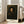Wall-mounted portrait print of a man in contemplative pose, rendered in earthy browns and golds with minimalist impressionist brushwork.