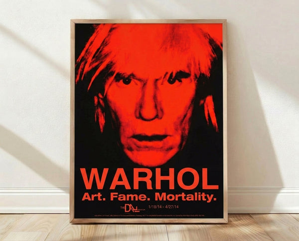 Pop art self-portrait with abstracted facial features in bold neon and dark tones, framed poster exploring themes of fame and identity on a gallery wall.