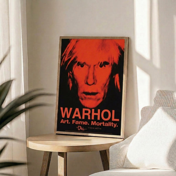 Bold pop art self-portrait in vivid and dark color combinations with distorted facial geometry, framed poster embodying the aesthetic tension between fame and oblivion.
