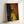 Framed portrait print in expressionist style depicting a faceless man amid shadowy, turbulent brushstrokes and somber palette.