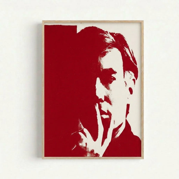 Striking contemporary portrait artwork with red and white color blocking, rendered in minimalist pop art aesthetic and displayed as a framed print.