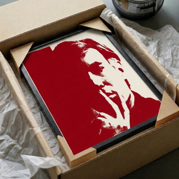 Minimalist portrait composition in striking red and white palette, embodying pop art aesthetics and shown framed as modern wall art.