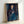 Man gazing directly outward while smoking a cigarette in this expressionist self-portrait with deep shadow tones and contemplative mood; framed art print.