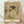Framed vintage portrait painting depicting Shah Jahan and his son in warm ochre and brown tones, rendered in an impressionistic style with contemplative, historical mood.