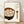 Minimalist Japanese woodblock-style poster of a bowl of tangyuan soup with a spoon, rendered in warm cream, rust brown, and tan tones, evoking nostalgic Showa-era charm and cozy comfort.