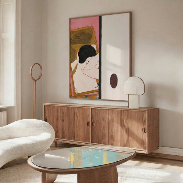 Framed Japanese woodblock poster presenting a contemplative woman gazing at her mirror, executed in the refined Showa style with a sophisticated palette of dusty pinks, ochre, and cream accented with red.