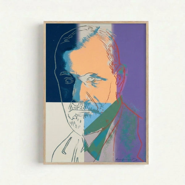 Colorful modern art print of Freud rendered in pop art style with bright hues and simplified forms, displayed as a framed poster on a wall.
