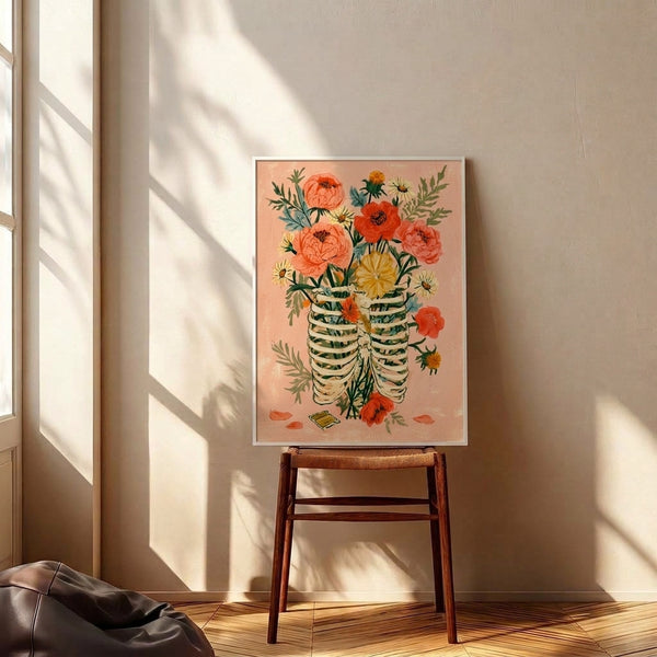 Whimsical watercolor illustration combining a skeleton ribcage with lush botanical blooms and leafy branches in dusty pink, cream, and sage green, creating a romantic yet contemplative cottagecore aesthetic.