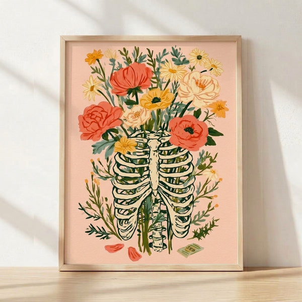 Surreal botanical art print featuring a skeleton ribcage filled with blush pink peonies, coral daisies, golden foliage, and sage green leaves on cream background, framed on wall.