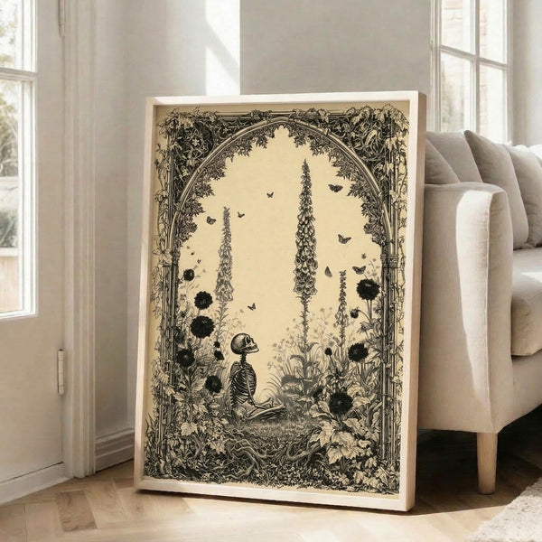Darkly whimsical framed poster depicting a skeleton surrounded by foxglove blooms and nature in contemplative gothic style, executed in intricate line art with cream, black, and gray palette.