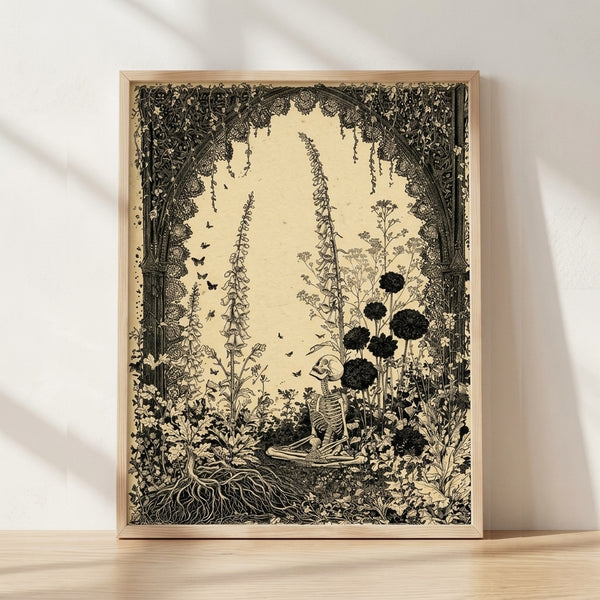 Framed black line art poster of a skeleton adorned with foxglove flowers and twining vines, rendered in gothic etching style on cream background.