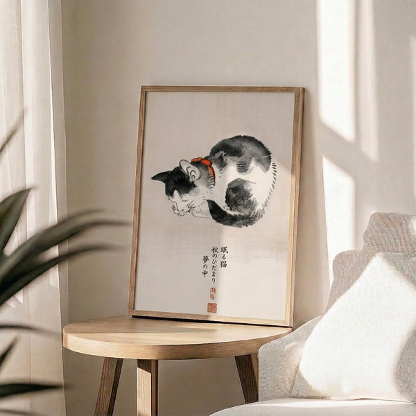 Serene sleeping cat depicted in traditional Japanese art style using cream, black, and warm orange-red on a contemplative framed poster with calligraphic elements.