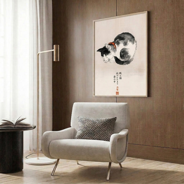 Minimalist framed print of a tranquil cat in cream and gray tones with black outlines and orange-red accents, accented by Japanese calligraphy for peaceful wall display.