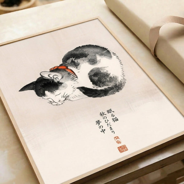 Contemplative woodblock-style wall art showing a restful cat in soft cream, black, and orange-red hues alongside calligraphic text in a serene, minimalist design.