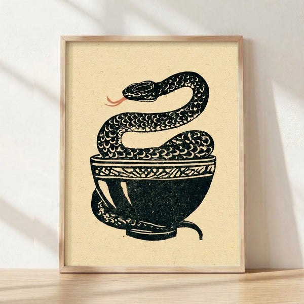 Japanese woodblock print of a coiled snake nestled in a teacup, rendered in cream, black, and dark teal with rust red accents, evoking a whimsical and curious mood.