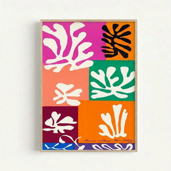 Framed art print displaying delicate floral forms in cool blues, grays, and cream, created with bold simplified shapes characteristic of mid-century modern design.