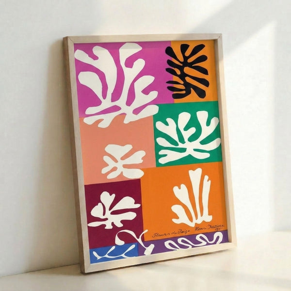 Contemporary wall art showing stylized snow flowers rendered in soft geometric cut-outs with a serene, peaceful mood through its gentle color palette.