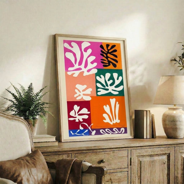 Contemporary abstract poster showcasing organic flower forms in white, red, blue, and yellow creating a light, joyful composition.