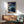 Japanese-inspired wall art showing a contemplative snowy pavilion landscape at night, with elegant brushwork in cream, navy, and dark blue.