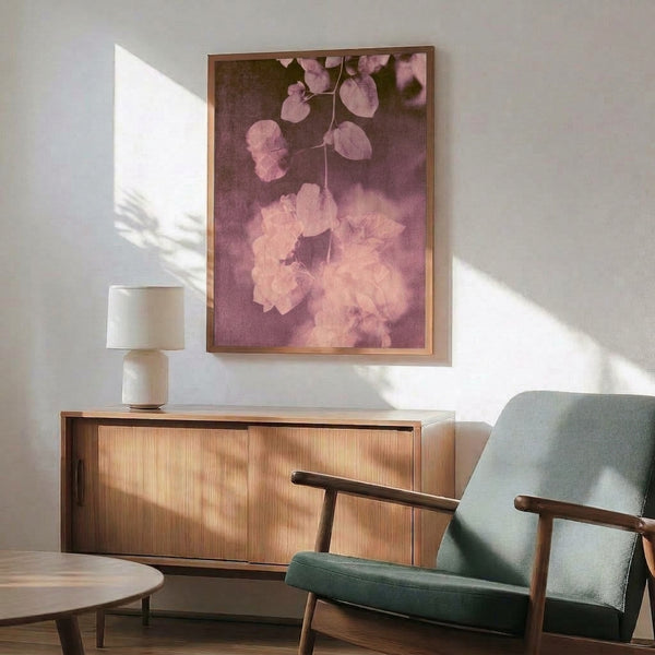 Soft impressionist watercolor painting of pale pink and plum bougainvillea branches, gentle and romantic botanical artwork displayed as a framed print.
